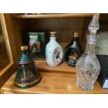 Two vintage Dimples Whisky decanters [empty] Bell's Christmas decanter with box [Empty] and Ornate