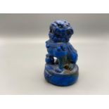 A Chinese Hand carved blue hard stone foo dog figure. [7cm]