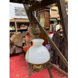 A Victorian rise and fall paraffin lamp.