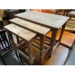 Antique pine nest of three tables.