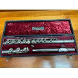 A Vintage Cambridge The British Band Instrument Co Ltd Flute with Sterling silver mouth piece.