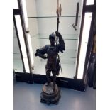A Large metal cast cavalier soldier figurine. [115cm in height base-tip of spear]