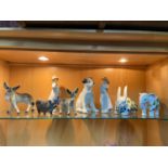 A Lot of collectable porcelain to include Royal Doulton pig, Two Nao figurines and USSR Dog Figure