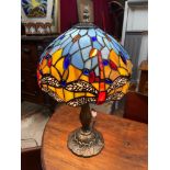 A Tiffany style dragon fly table lamp. In a working condition. [40cm height]
