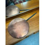 A Large Victorian Copper and cast metal handle pan.