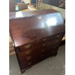 A Georgian writing bureau designed with fitted drawer interior. Comes with original brass handles.