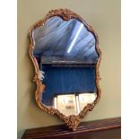 A Vintage Atsonea ornate gilt framed mirror. [75x46cm]