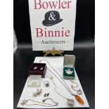 A Lot of silver jewellery which includes Silver and amber pendant with silver chain, Sterling silver