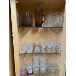 Three shelves of crystal which includes Edinburgh crystal Whisky, port and sherry glasses, Smokey