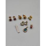 A Lot of 4 pairs of 9ct gold and gem stone earrings, which includes Ruby and diamond heart shaped