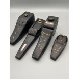 A Lot of four antique hand carved wooden snuff shaped boots. Showing various detailing to include