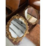 Two vintage gilt framed mirrors.