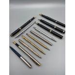 A Lot of vintage ball point and fountain pens which includes Parker, Taylor pen, Cross, Sheaffer,