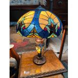 A Beautiful designed Vintage Tiffany style table lamp. In a working condition. [58cm height]