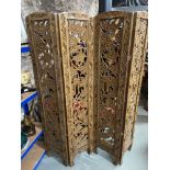 A Large ornate carved four way screen [178cm height]