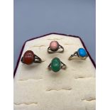 Four vintage silver 925 ladies rings set with various gem stones which includes agate.