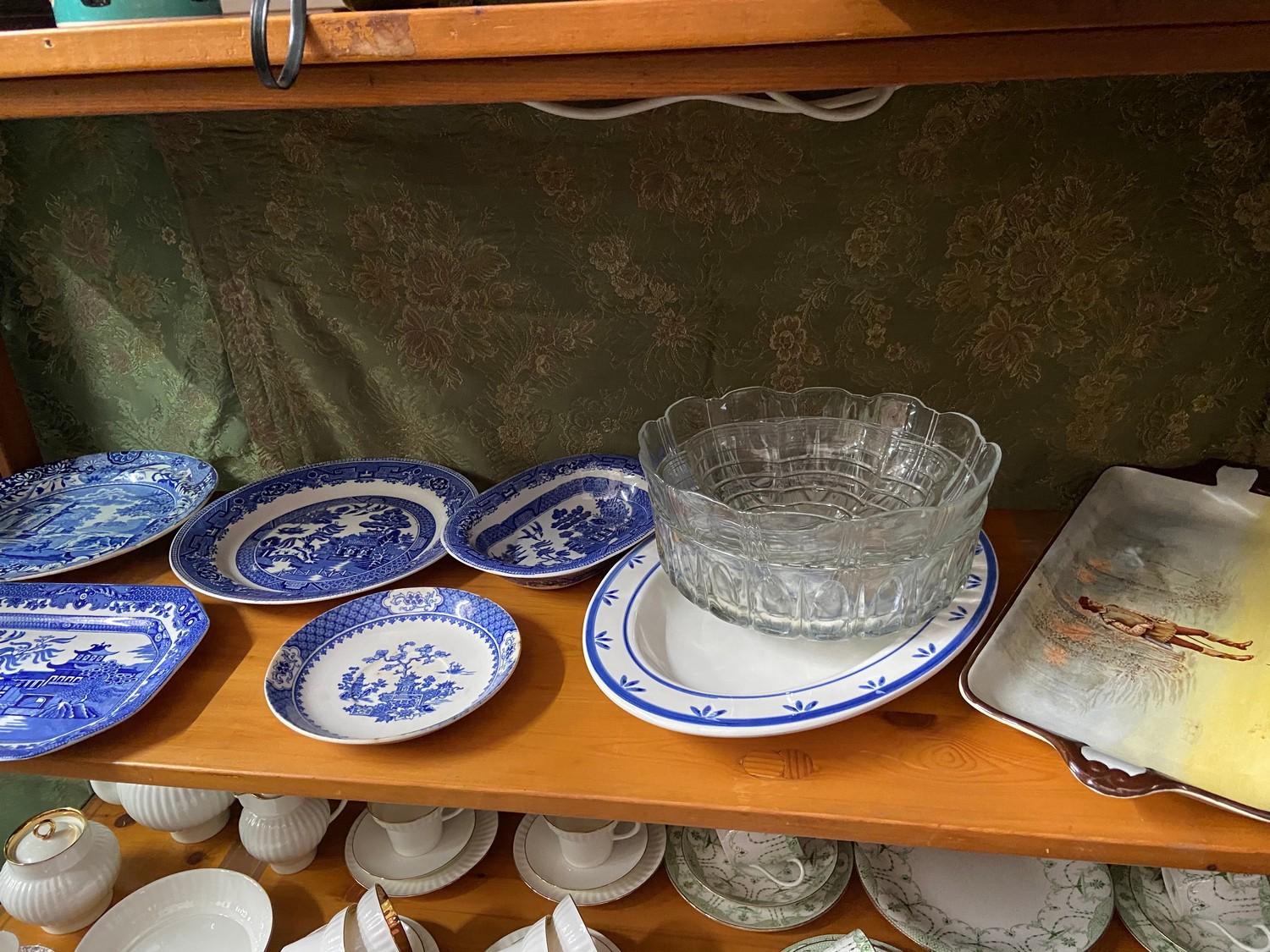 A Quantity of Porcelain blue and white dishes, plates and serving plates. Also includes A Large