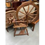 Antique spinning wheel.
