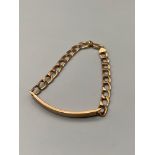 A Heavy 9ct gold curb I.D Bracelet. [Weighs 10.31grams] [18cm length]