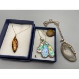 A Silver 925 and agate pendant with silver chain, Silver and various coloured wood pendant with