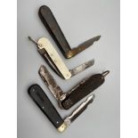 A Lot of four various Military [style] pocket knives.