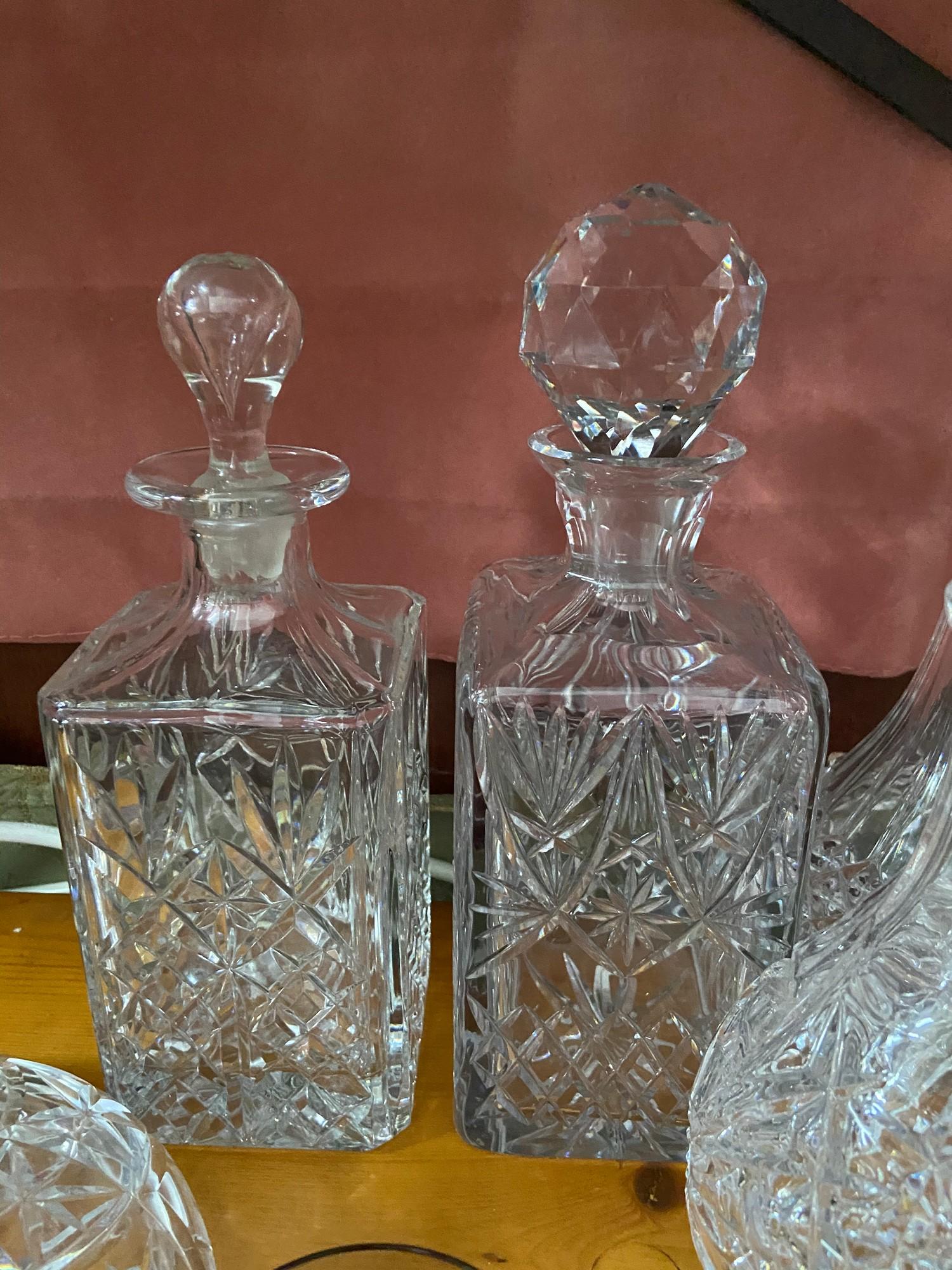 A Lot of vintage and antique cut crystal and glass decanters which includes smoked glass whisky - Image 2 of 6