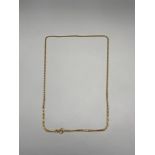 An 18ct gold necklace, 50cm in length. [8.82 Grams]