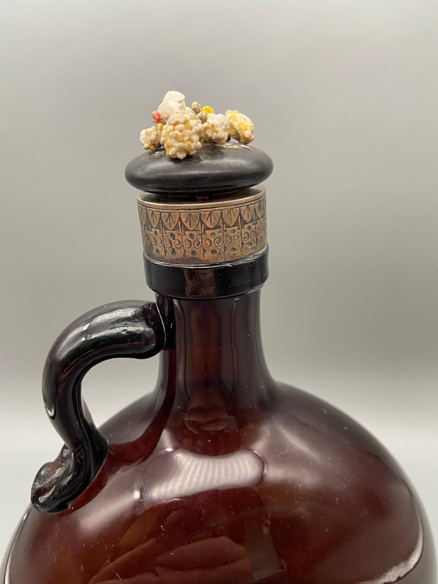 A Victorian brown glass whisky flagon designed with a possible silver collar, Also comes with a - Image 3 of 7