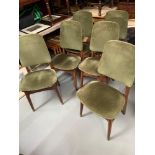 A Set of 6 mid century Retro Teak and green material upholstered dining chairs. Finished with a stud