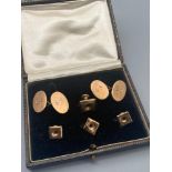 A Pair of antique Birmingham 9ct gold cuff links and 4 9ct gold studs. Comes with original display