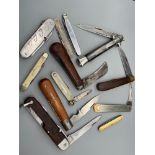 A Quantity of mixed antique and vintage pocket knives.