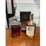 A Crystal Bowmore Scotch Whisky decanter with pewter golfer stopper. Together with a Vintage 1974