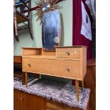A Mid century pedestal dressing table. Designed with large mirror, Two surfaces for utensils and two