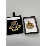 Two antique military badges. 8th Kings Royal Irish Hussars cap badge and Army Cyclist Corps badge.