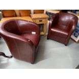 A Pair of stylish contemporary brown leather tub chairs.