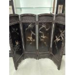 A 19th century Japanese four section screen. Depicting paua shell inlaid birds against a black
