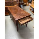 A Victorian pembroke table with drop ends and single under drawer.