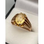Antique 9ct gold Gentleman's ring set with a large pale yellow stone. Ring size S. [Weighs 5.
