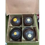 A Set of four vintage wooden bowls by Thomas Taylor Glasgow. Complete with original box.
