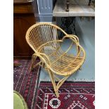 A Stylish Retro Bamboo cane, egg tub chair.