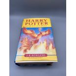 A 1st Edition Harry Potter and the order of the Phoenix book by J.K.Rowling.