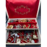 A Jewel box containing a quantity of jewellery and watches. Includes Casio Quartz watch, Avia Marine