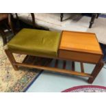 A Mid century teak telephone table with green material cushion seat area. Single pull out drawer and