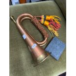 A Military style brass and copper bugle with tassels. Together with a Royalty crest pewter &