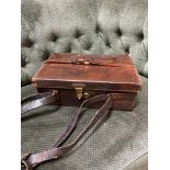 Antique brown leather cartridge carry case. Designed with a well made lock