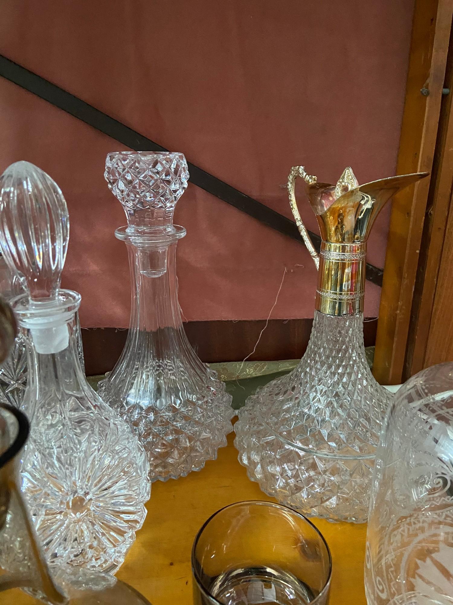 A Lot of vintage and antique cut crystal and glass decanters which includes smoked glass whisky - Image 3 of 6