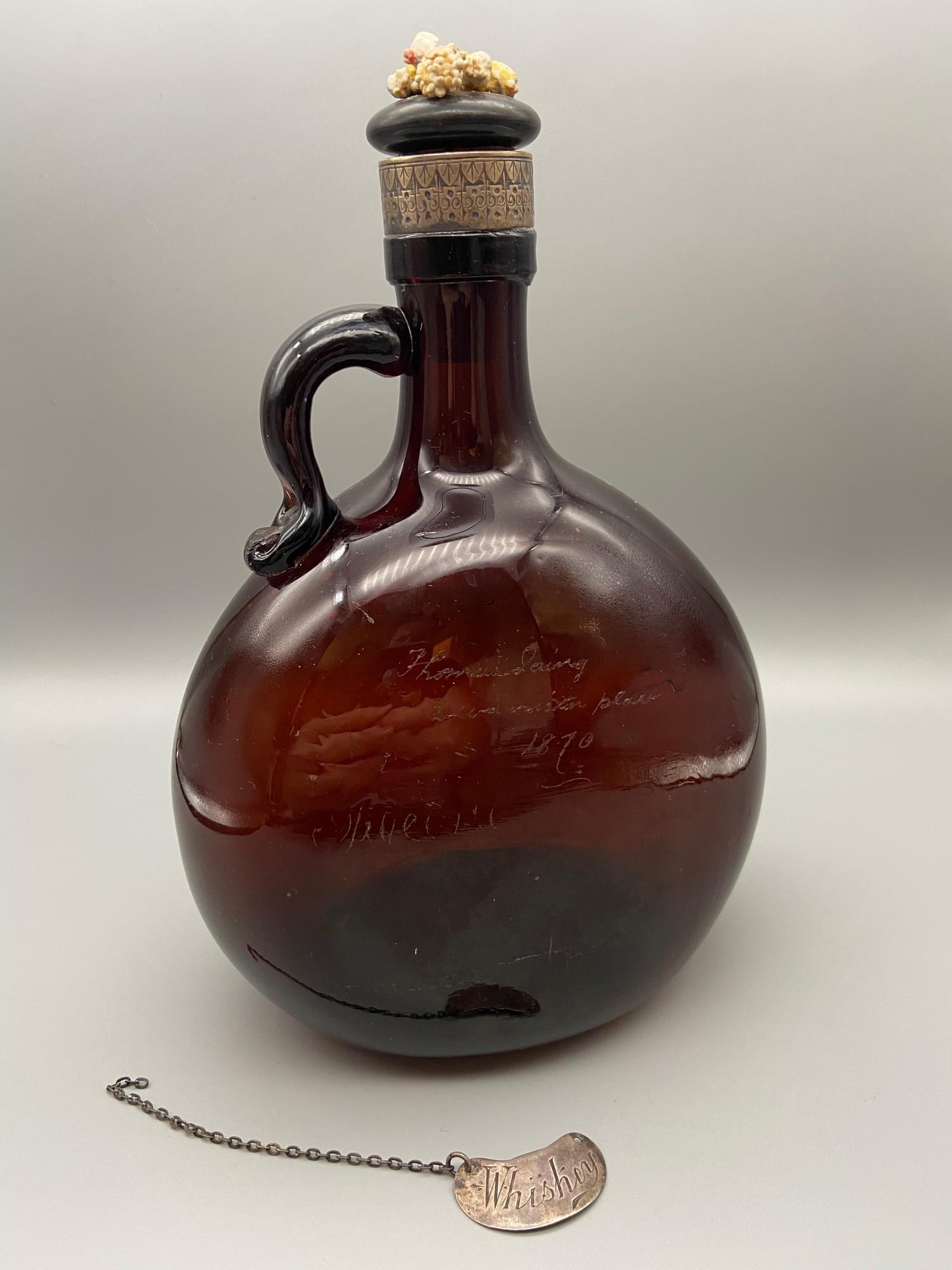 A Victorian brown glass whisky flagon designed with a possible silver collar, Also comes with a - Image 5 of 7