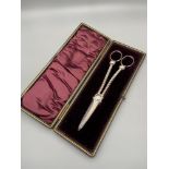 A Pair of Victorian silver plated Grape Scissors within a fitted case. Made by Charles James Allen &