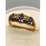 Antique ladies Chester/ Sheffield 18ct gold ring set with three sapphires and two diamonds. Ring