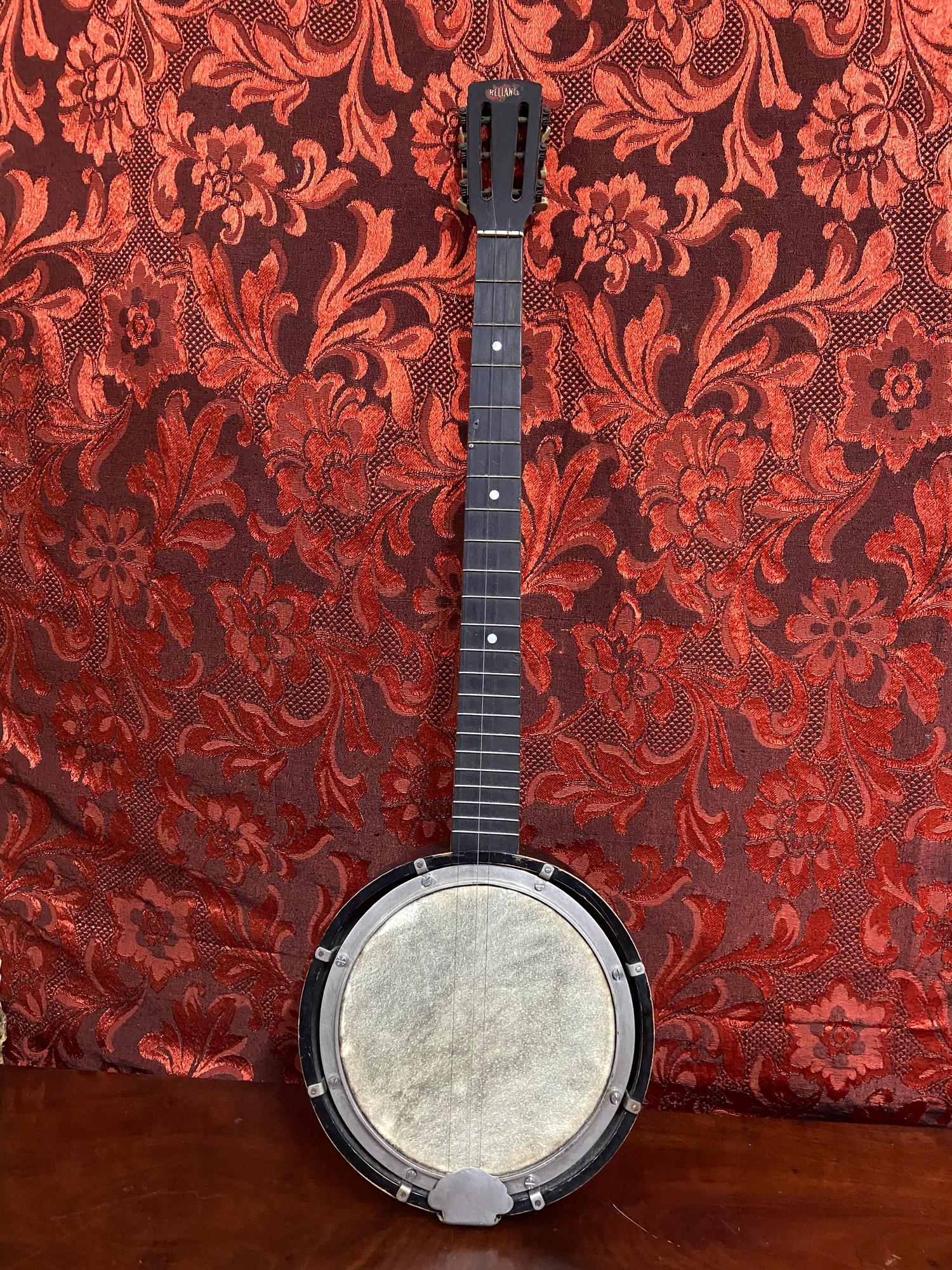 A Vintage 6 string banjo produced by Reliance.